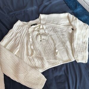 Kendall & Kylie women’s Medium cropped sweater long sleeves laced up V-neck.